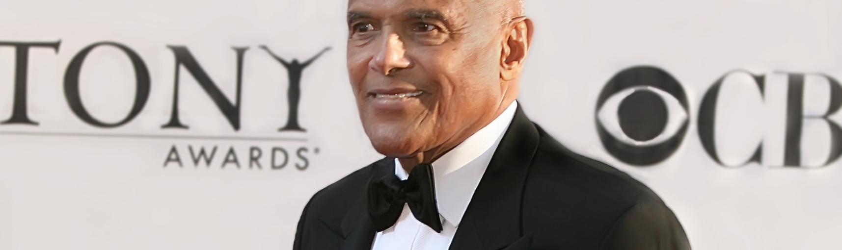 Close up photo of Harry Belafonte in a tuxedo